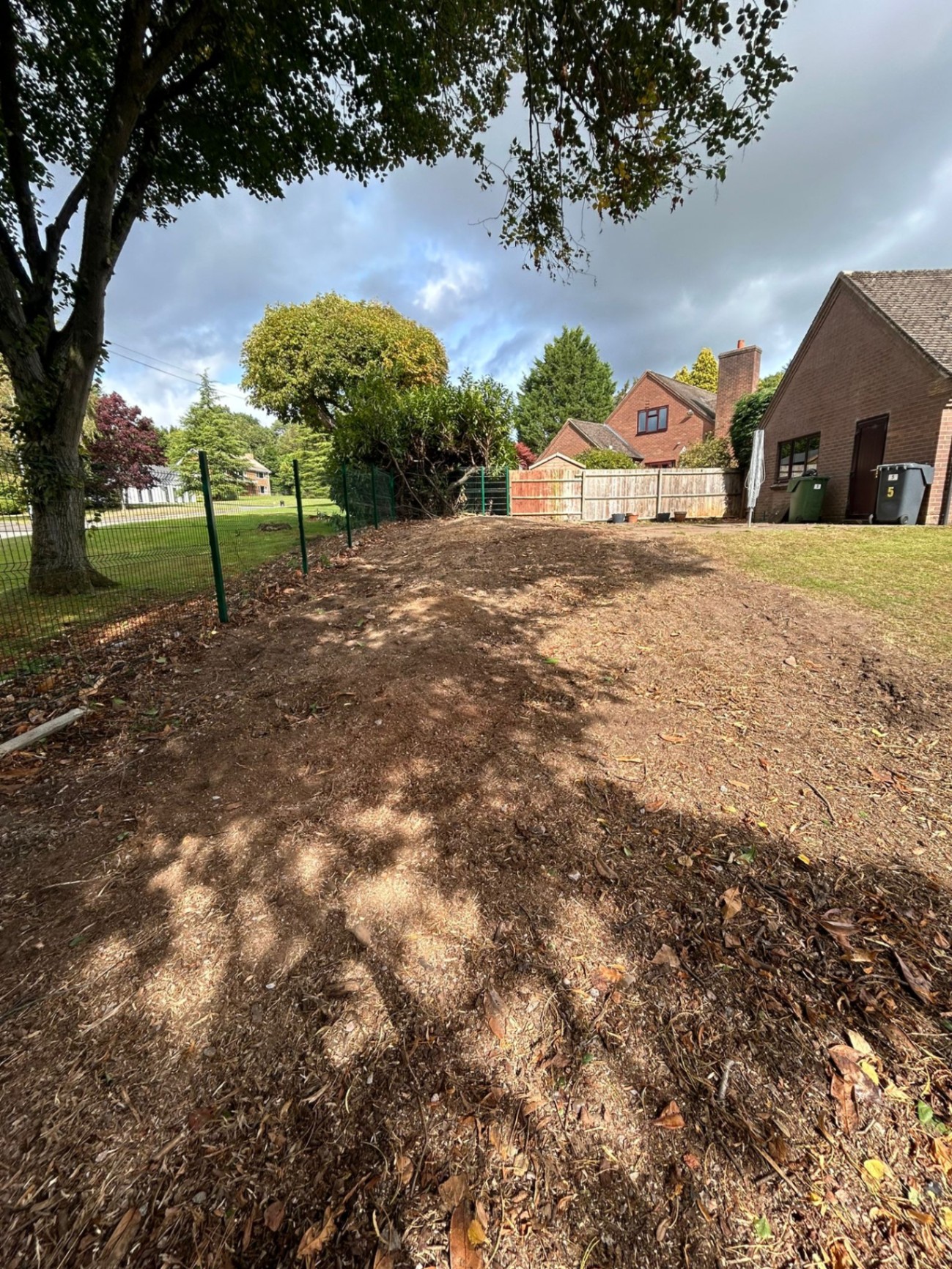 Clean, level garden surface after expert stump grinding and removal